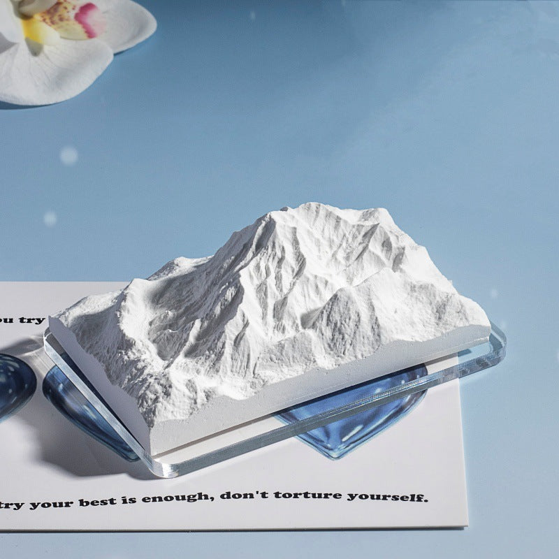 Natural stone crystal diffuser mountain insert on clear blue tray base