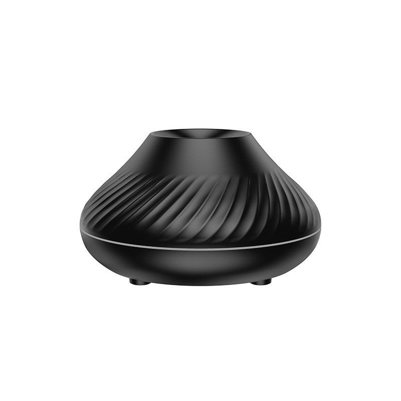 Black flame-style aroma diffuser with ribbed top and round base feet