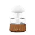 Aroma diffuser with cloud top, clear tank, and wood-grain base