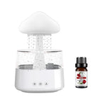 White cloud-top aroma diffuser with mist rising from center nozzle