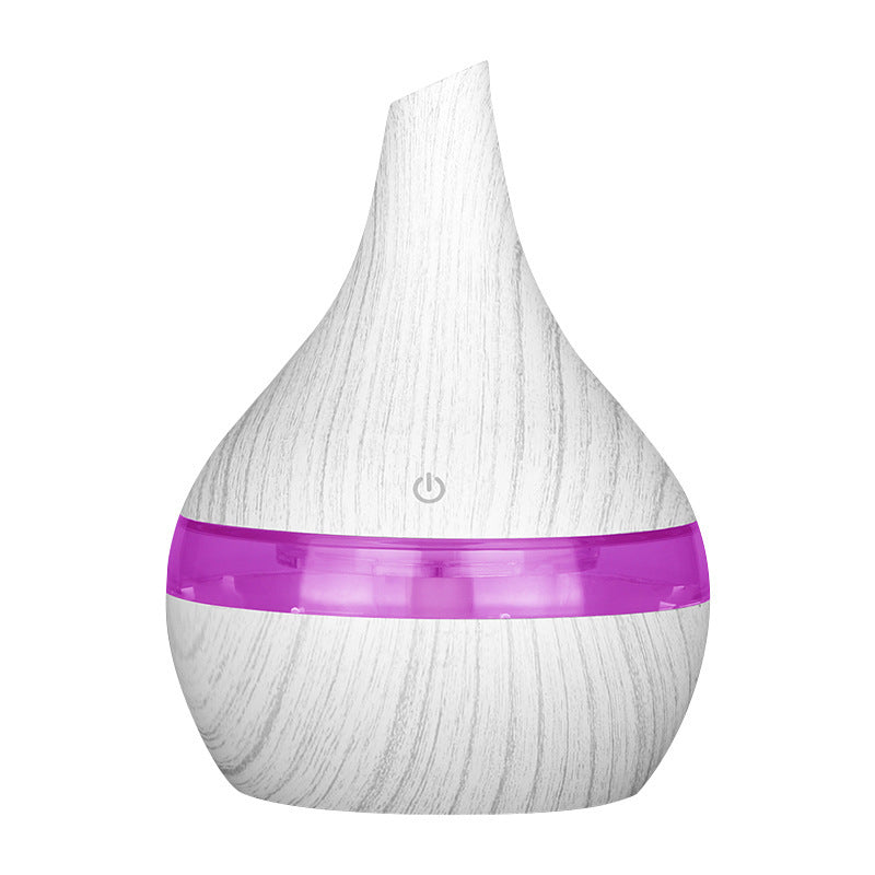 White wood grain aroma diffuser with purple light ring and power icon