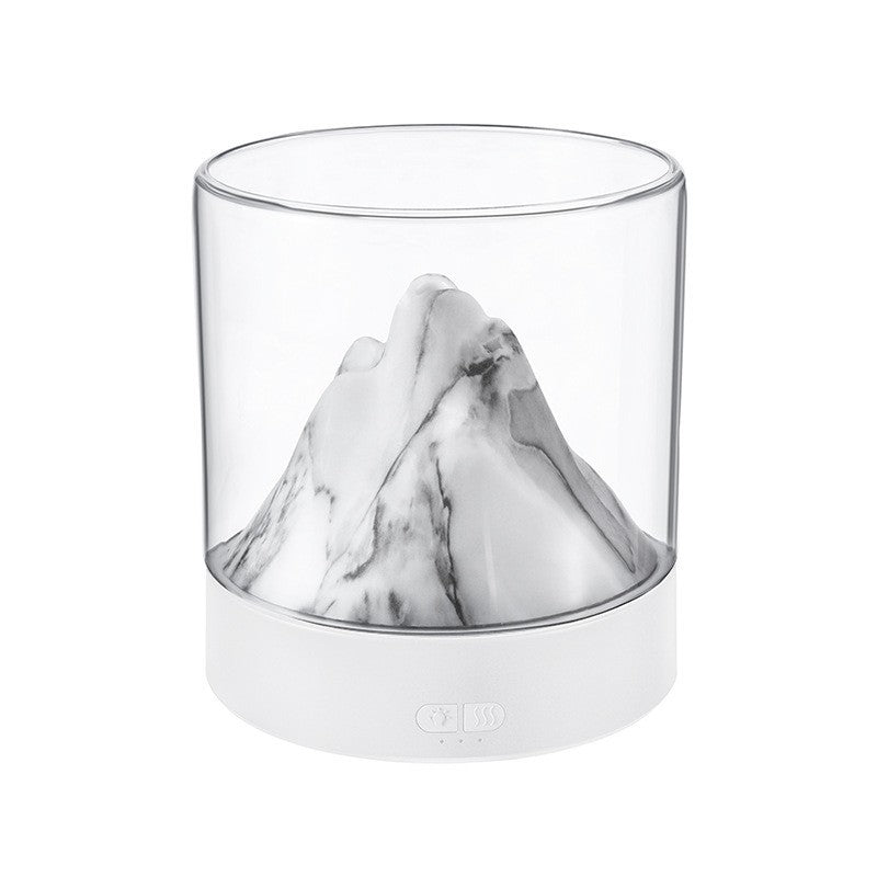 Mountain View aroma diffuser with white base and clear dome, gray mountain insert inside.