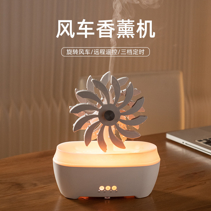 White water-drop aroma diffuser with flower-shaped top and warm glow on dome, LED buttons