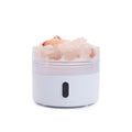 White diffuser with pink salt crystals in clear cover and front oval slot