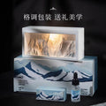 Crystal diffuser gift set with lit mountain-style unit, gift box and essential oil bottle