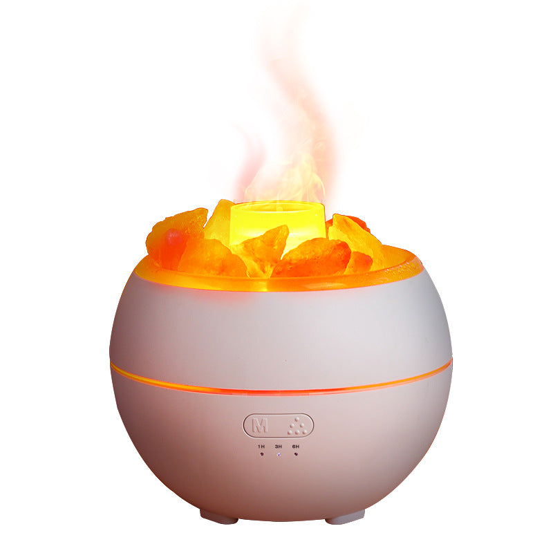 Dark purple salt stone crystal aroma diffuser with glowing orange flame-like crystals