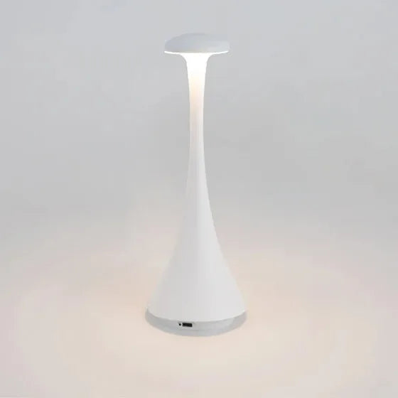 Pearl white cordless mushroom touch table lamp with slim tapered body and round top diffuser.