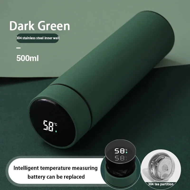 Dark green smart thermos with digital temperature display and tea infuser accessory