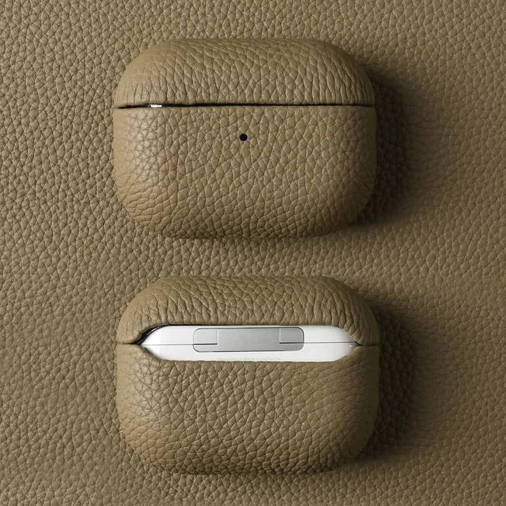 Khaki handmade leather AirPods case with AirPods showing