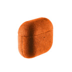 Amber orange Alcantara AirPods case, closed; textured suede finish