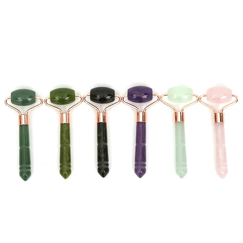 Jade roller massagers in multiple colors: forest sage, celadon, amethyst, and rose quartz