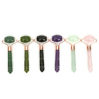 Jade roller massagers in multiple colors: forest sage, celadon, amethyst, and rose quartz