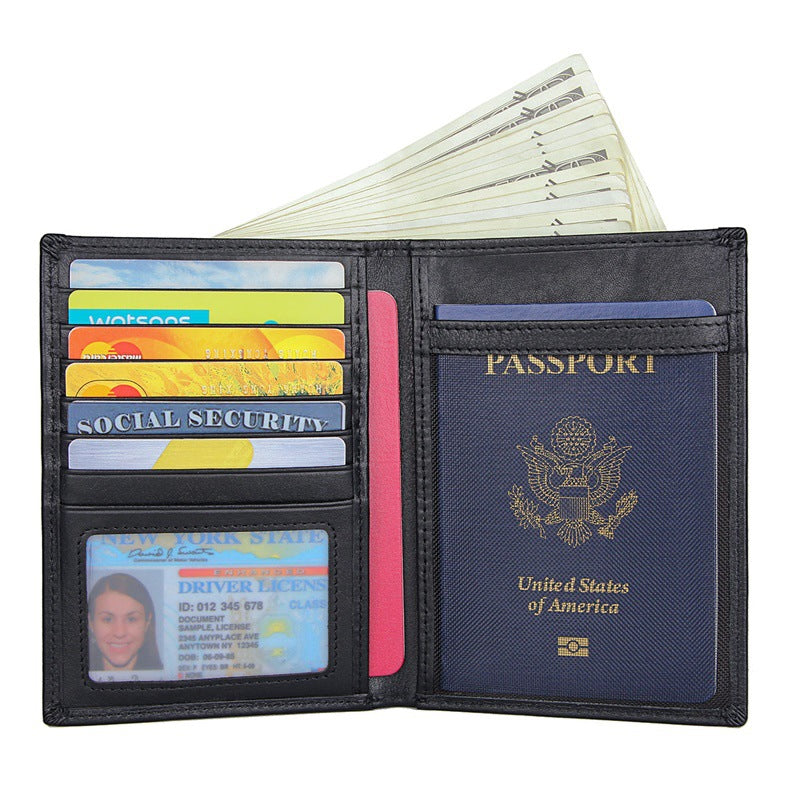Midnight black travel wallet holding cards and passport in the clear window pocket.