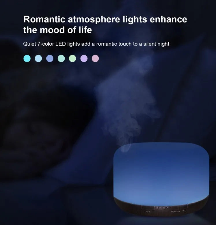 Blue aroma diffuser humidifier emitting mist, night light glowing on the top