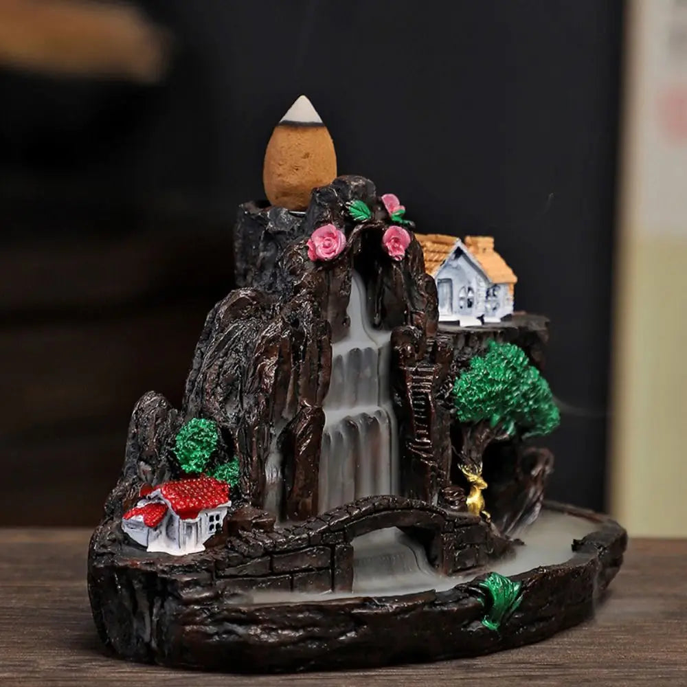 Backflow incense holder figurine: dark mountain waterfall, roses, cottage and glowing cone