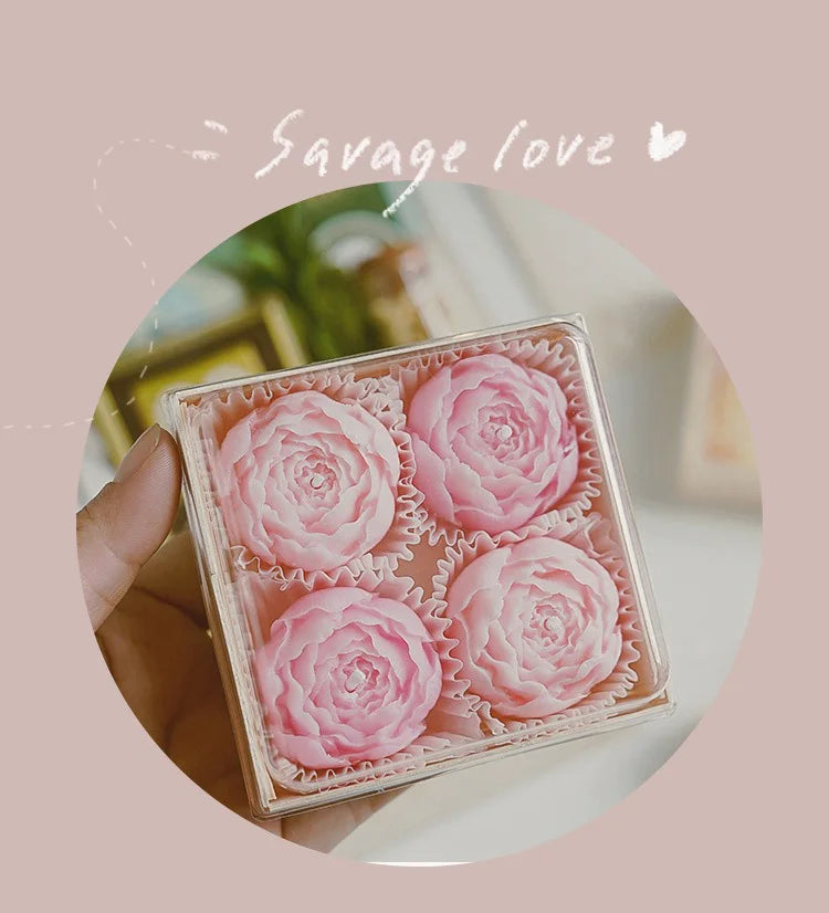 Blush pink rose-shaped scented candle gift box with five rose candles in tray