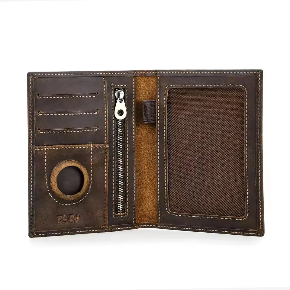 Warm espresso leather passport wallet interior with card slots, zipper, and round AirTag window