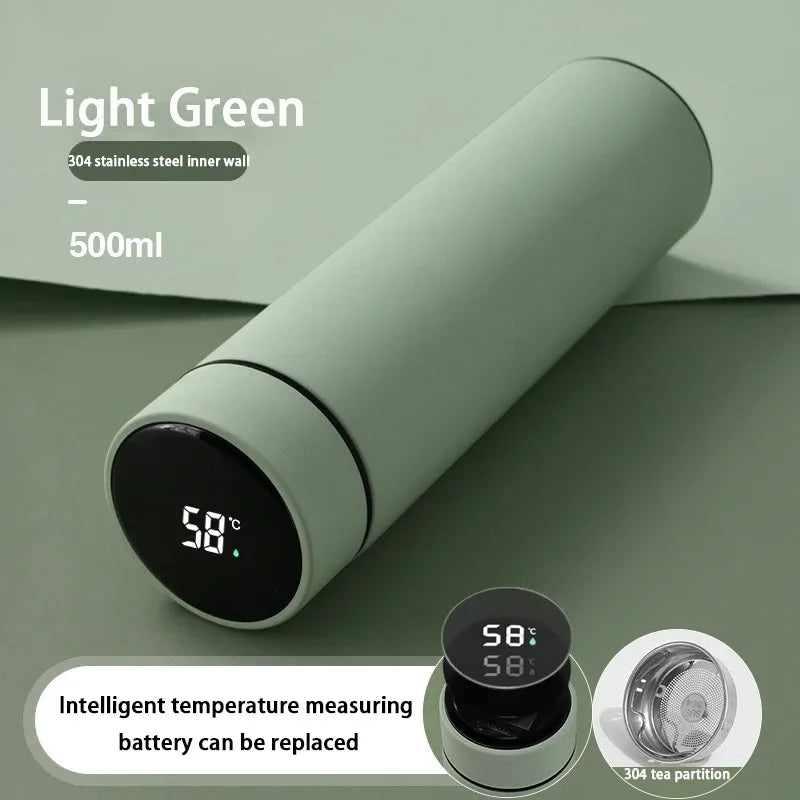 Light green smart thermos with digital temperature display and tea infuser accessory