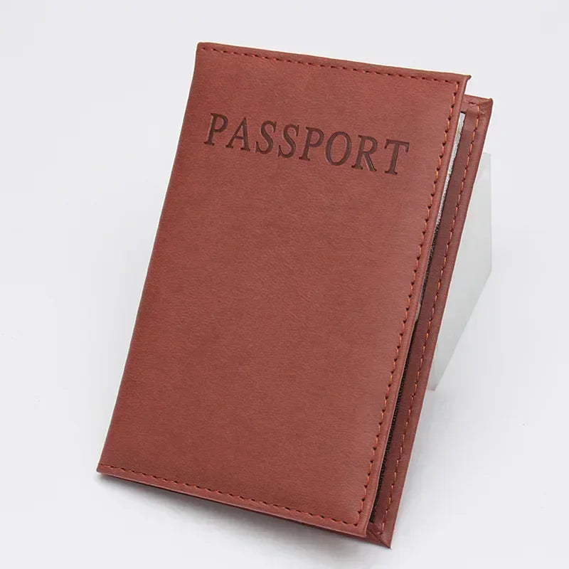 Cognac brown classic travel passport sleeve with “PASSPORT” text