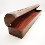 Carved rosewood incense box with lid open, showing red-lined interior channels