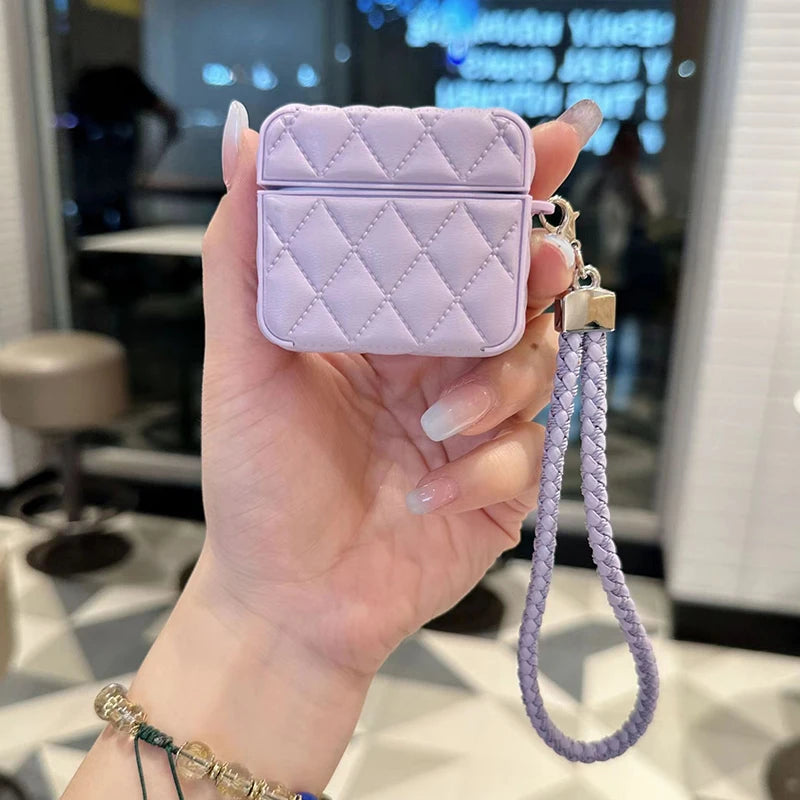 Lavender quilted leather AirPods case with lanyard strap and front clasp