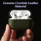Emerald Sage leather AirPods case, open with earbuds and protective microfiber-lined interior