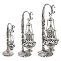Ornate metal censer with ash catcher, chain-hung lid and decorative base