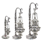 Ornate metal censer with ash catcher, chain-hung lid and decorative base