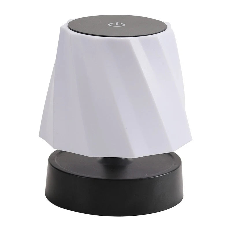 White cordless LED lamp with dark top control and matte black base