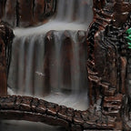Close-up of the Fairy Mountain incense waterfall channel and rugged stone base
