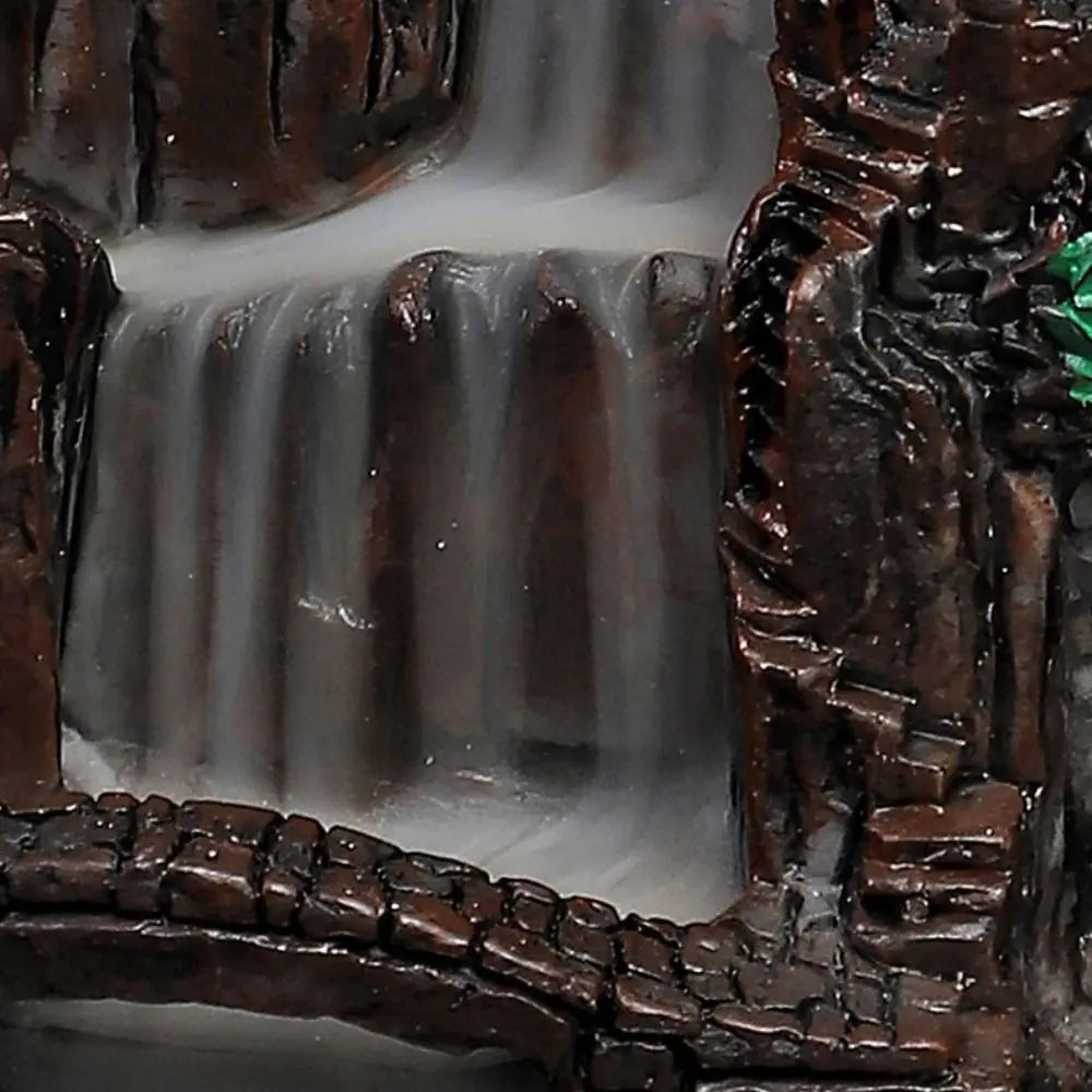 Close-up of the Fairy Mountain incense waterfall channel and rugged stone base
