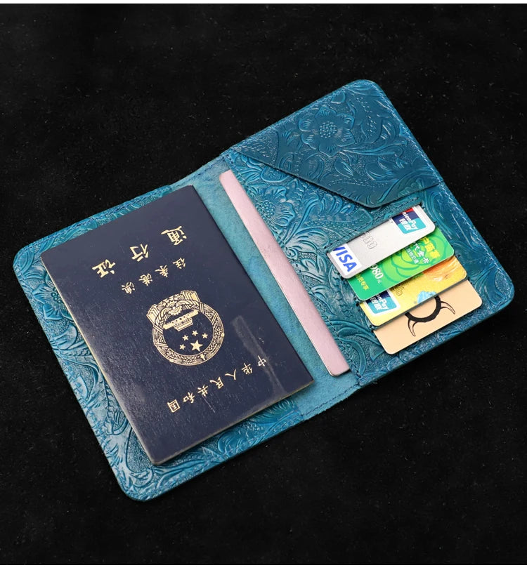 Midnight Blue travel folio open to card slots with embossed cover and ID window