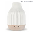 White Rubberwood aroma diffuser: white ribbed ceramic top, light wood base and buttons