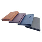 Set of PU leather card holders in assorted colors, stacked with card slots
