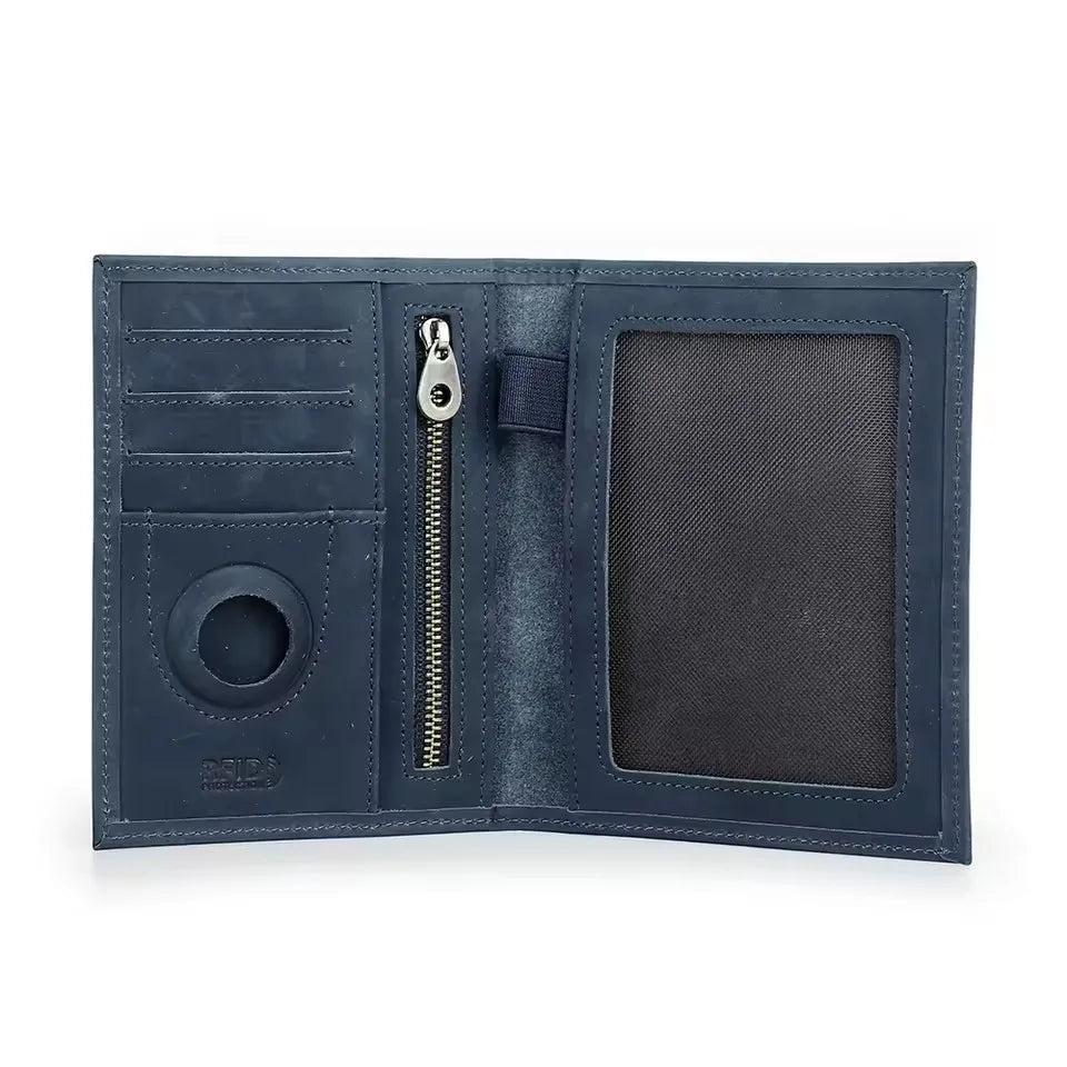 Midnight blue leather passport wallet interior with card slots, zipper pocket, and ID window