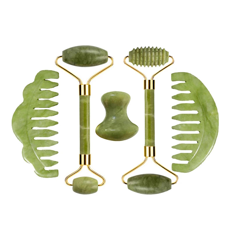 Complete jade ritual set: double-sided gua sha, ribbed roller, and two oval massage stones