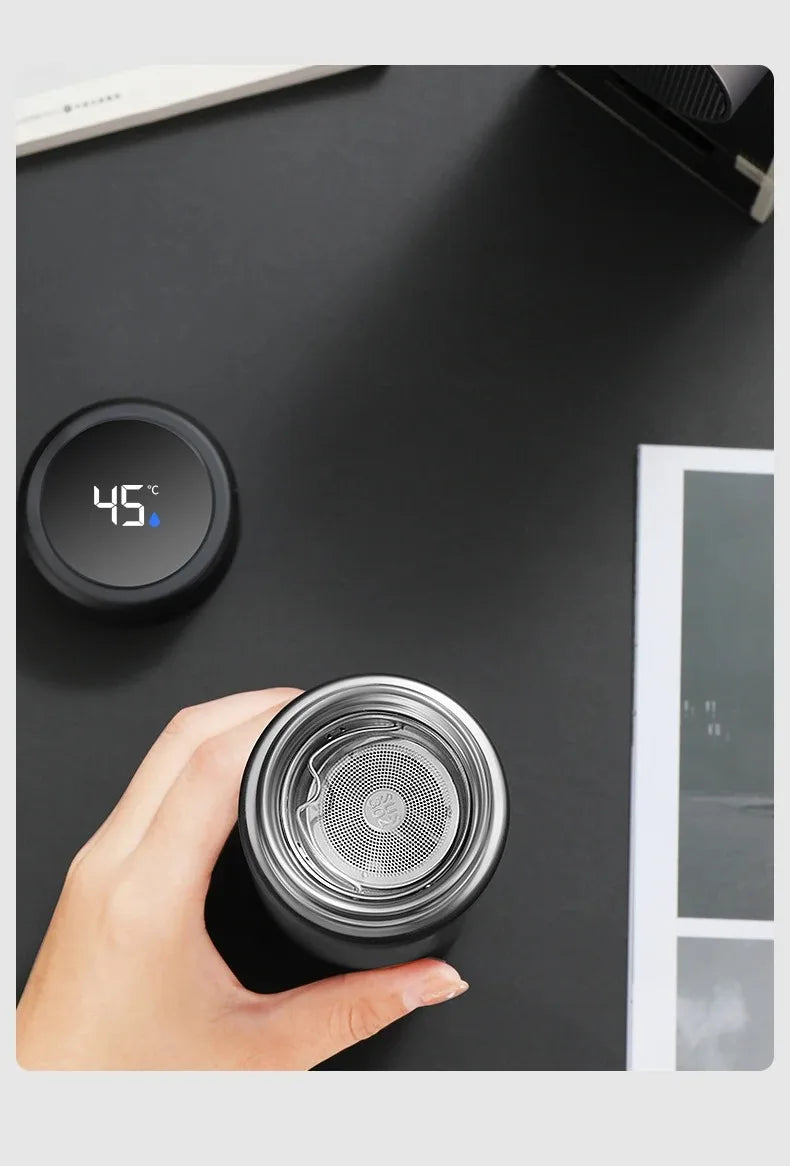 Stainless insulated thermos top open, showing internal mesh filter