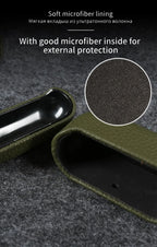 Dark green cowhide AirPods case interior with soft microfiber lining detail