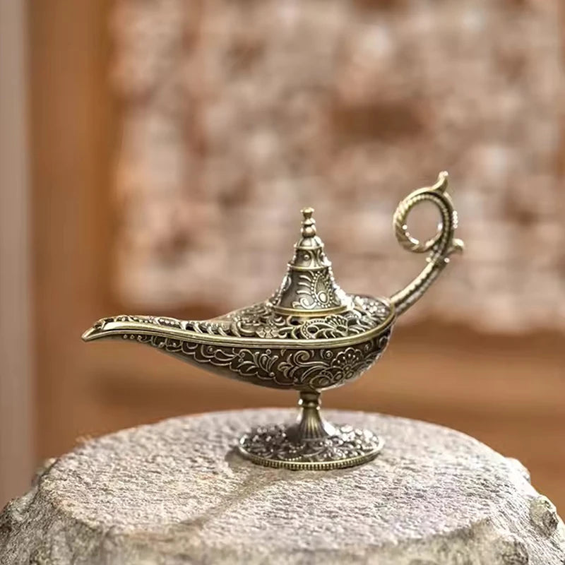 Brass incense burner lamp with conical top and engraved base on pedestal