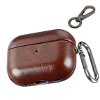 Textured AirPods Pro case in deep green leather with metal carabiner clip
