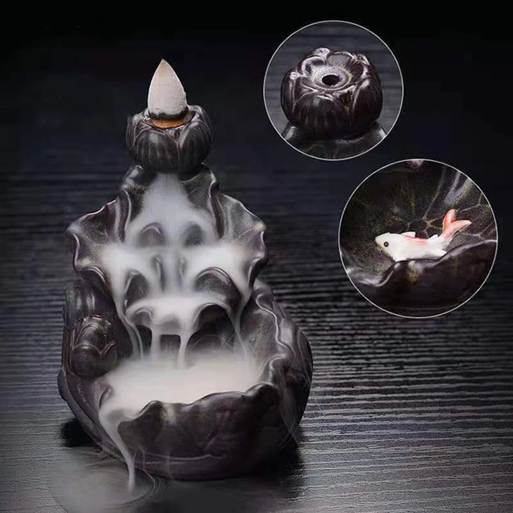 Backflow incense cone refill set with lit cone releasing smoke onto a burner base