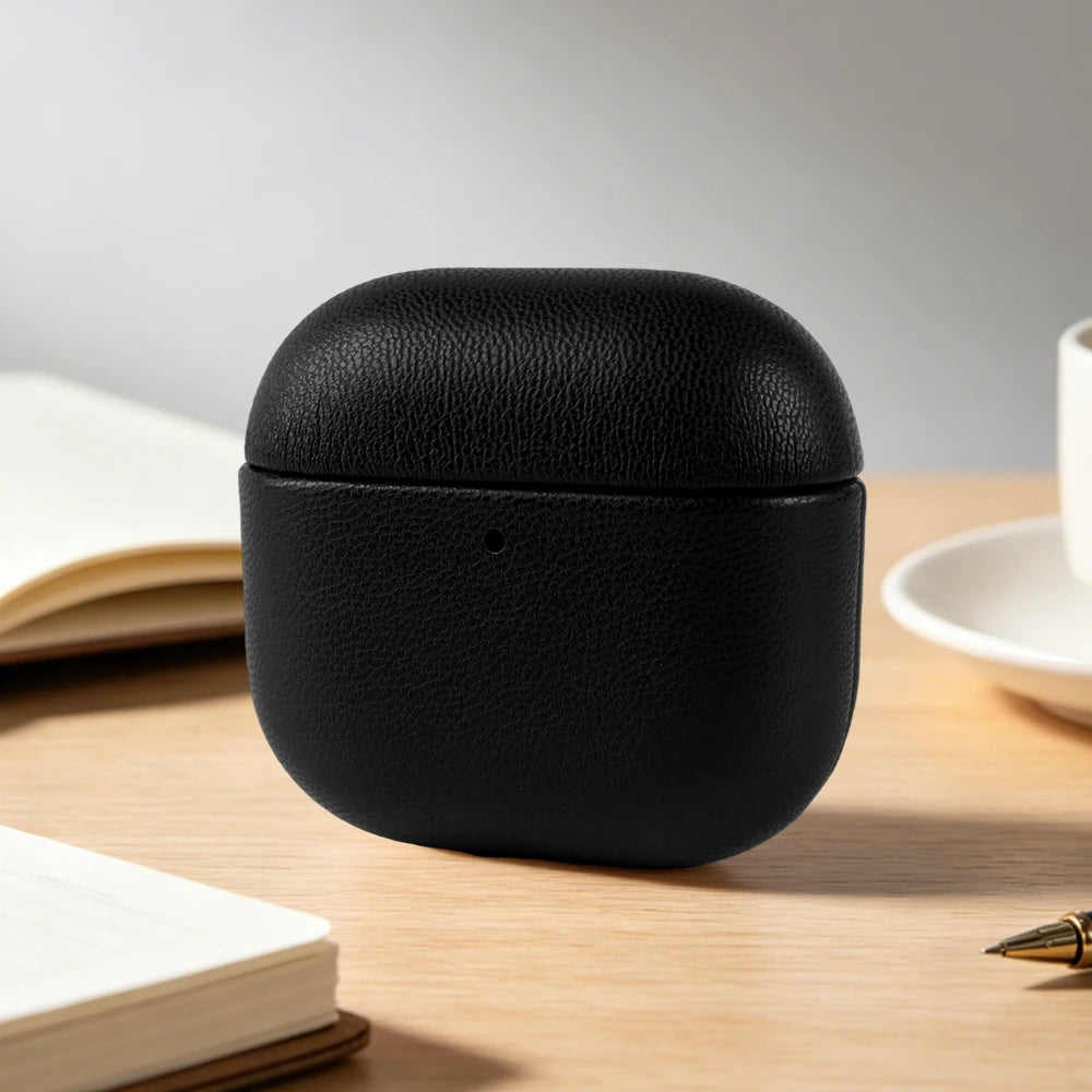 Obsidian black eco-leather AirPods case, rounded clamshell lid with small front opening