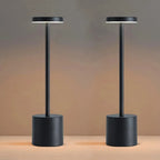 Obsidian portable LED touch lamp: dark cylindrical base with straight metal stem, lit top