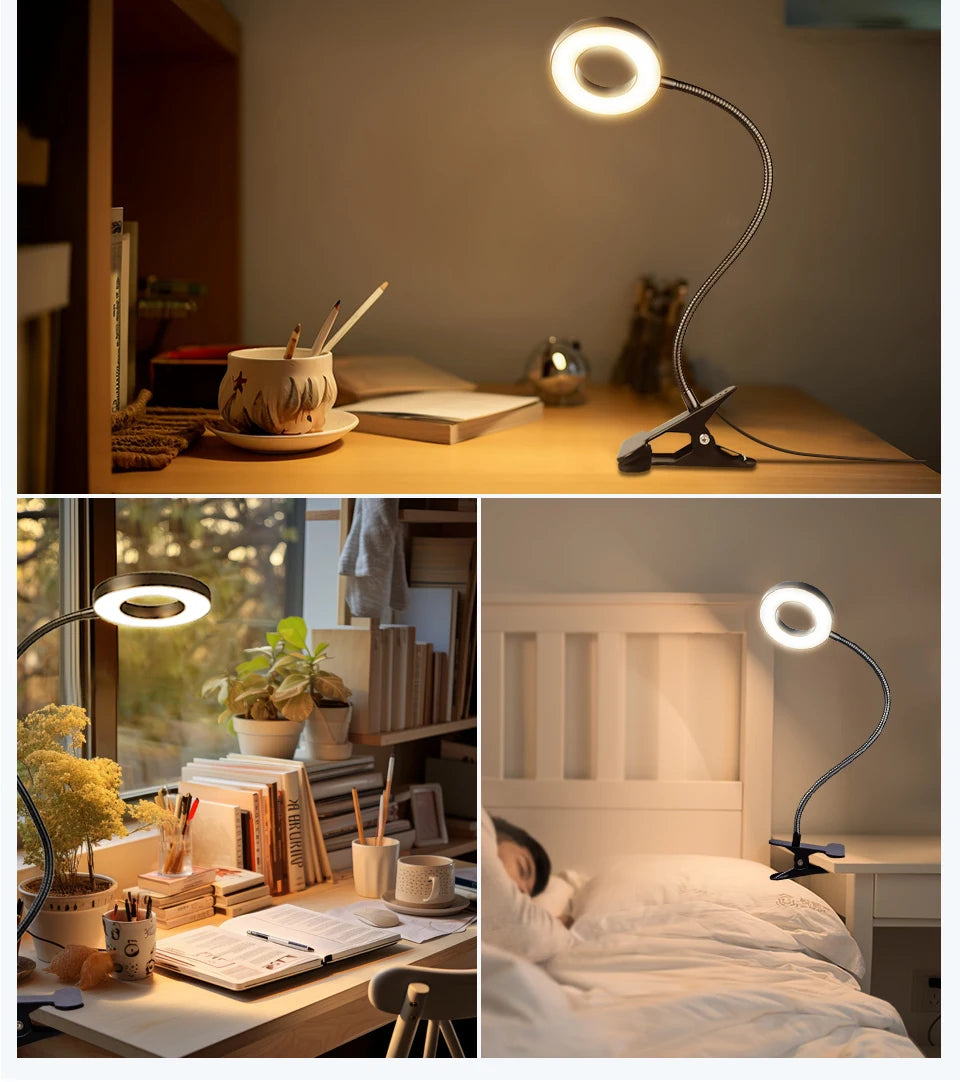 Glowing circular LED ring lamp on a desk with flexible gooseneck and clamp base