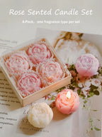 Rose scented candle set with pink rose candles and a lit peach rose candle