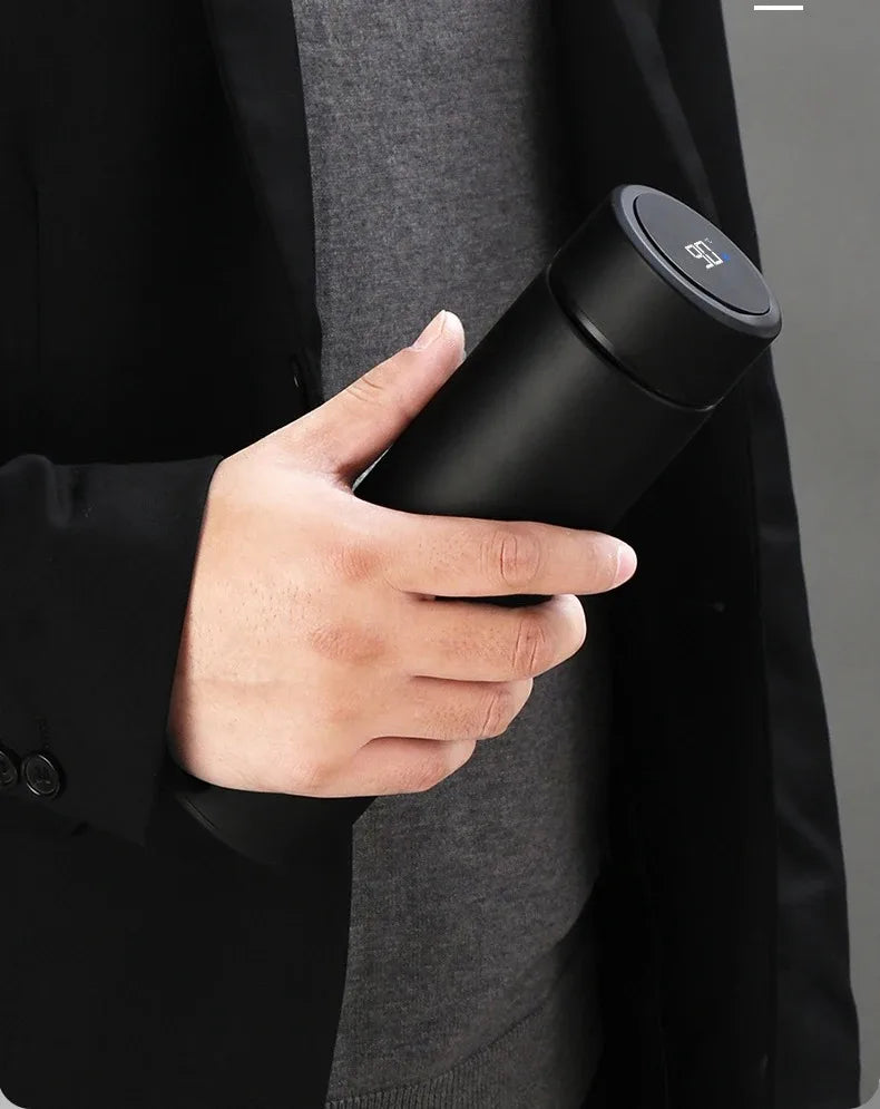 Black insulated thermos bottle with digital temperature display lid