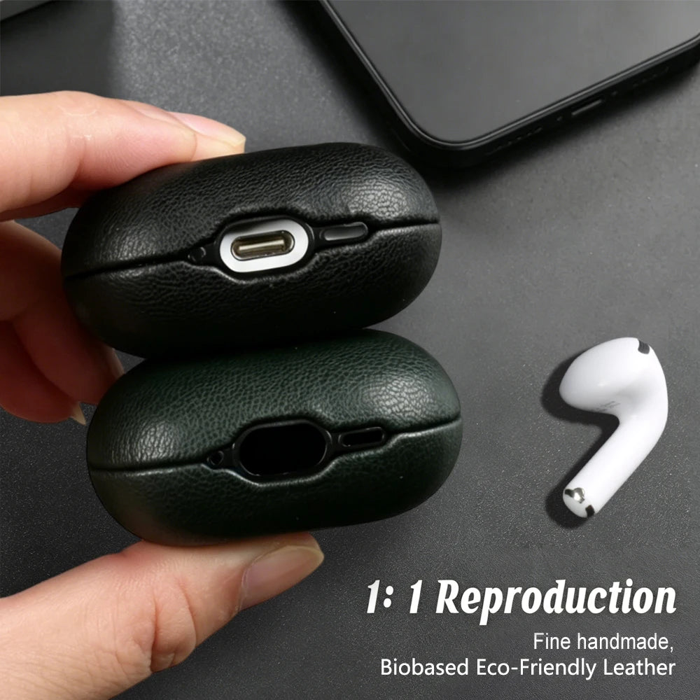 Black eco-leather AirPods case with charging port cutout; earbuds shown