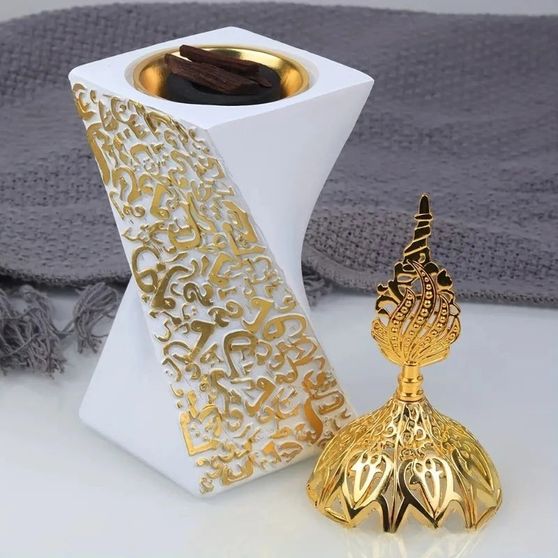 White resin bakhoor burner with gold lid top and gold engraved calligraphy panel