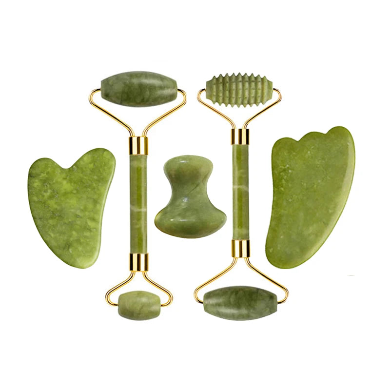 Complete nephrite jade beauty ritual set with multiple gua sha and roller pieces in gold