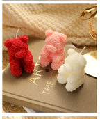 Rose bear scented candle set: red, pink, and ivory bear candles on the same base
